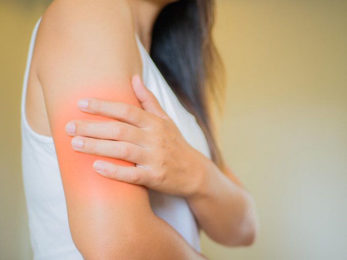 closeup female's arm arm pain and injury health care and medical concept