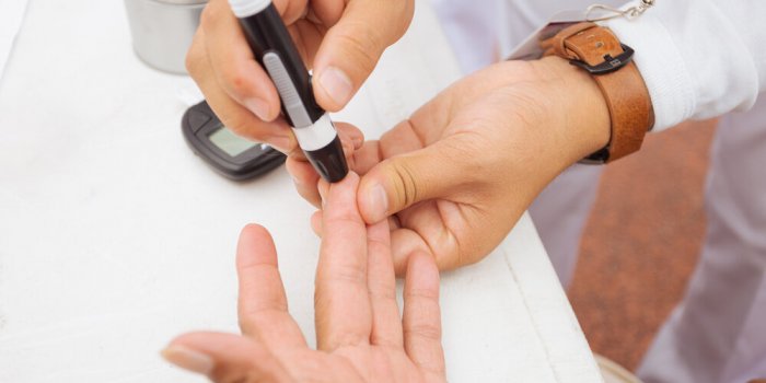diabetes checking blood sugar levels senior citizen in health campaign