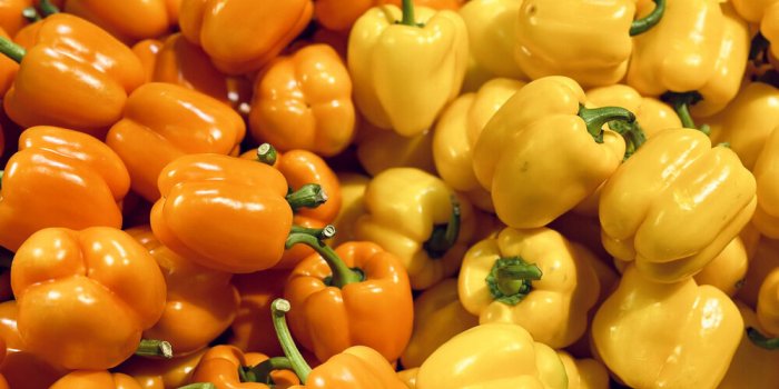 orange pepper and yellow pepper in the market