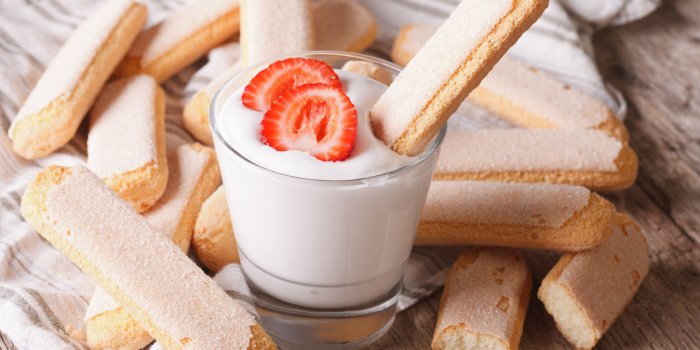 dessert of savoiardi with yogurt and strawberries horizontal