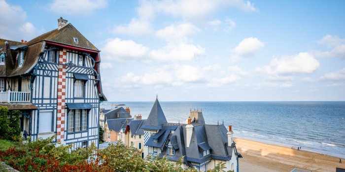 top view of trouville city with luxury houses and beautiful beach on the background during the morning light in france
