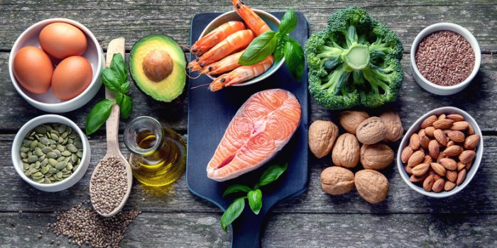 food sources of omega 3 and healthy fats foods high in fatty acids including seafood, vegetables, nut and seedsntop view