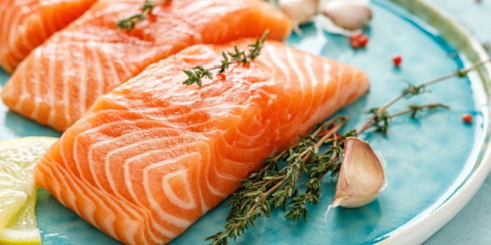 seafood fresh raw salmon or trout fillets with ingredients