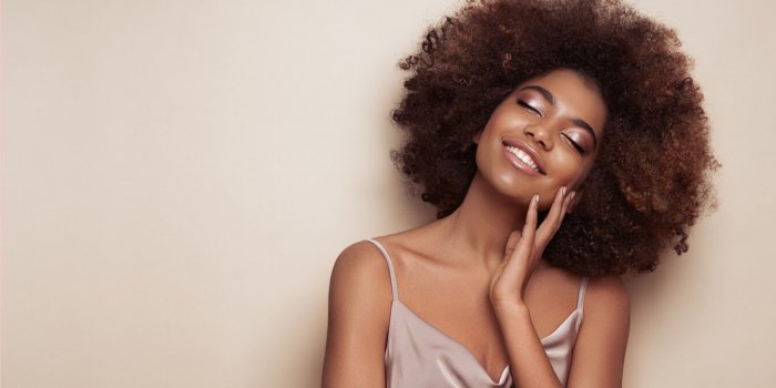 beauty portrait of african american girl with afro hair beautiful black woman cosmetics, makeup and fashion