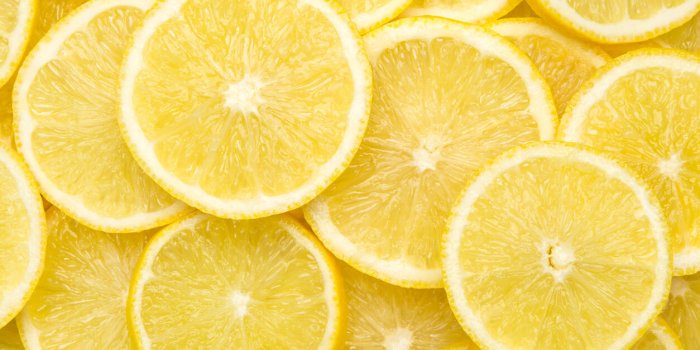 fresh lemon slices pattern background, close up