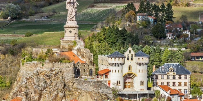 sanctuary of saint joseph of good hope in espaly-saint-marcel commune, the landscape of borne valley is at background hau...