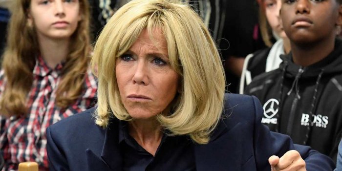 french president's wife brigitte macron gestures during a visit to raise awareness about bullying in a school of clamart,...
