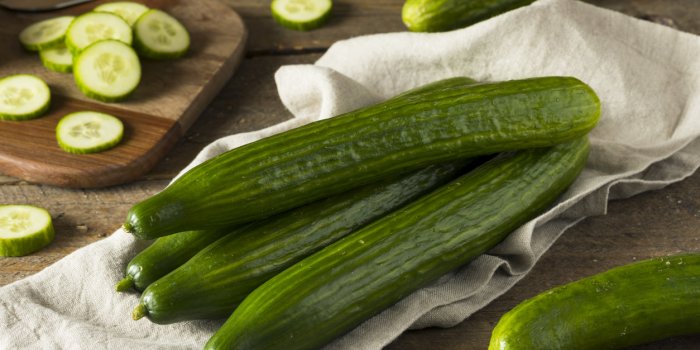 raw green organic european cucumbers ready to eat