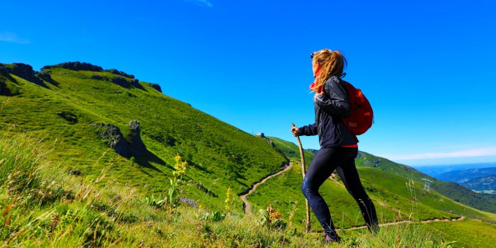 hiking trail, woman with backpack- plomb du cantal, auvergne-cantal