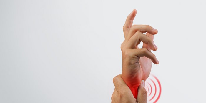 healthcare concept for medical symptom numbness and pain in fingertips, medical condition in a man's hand on white background