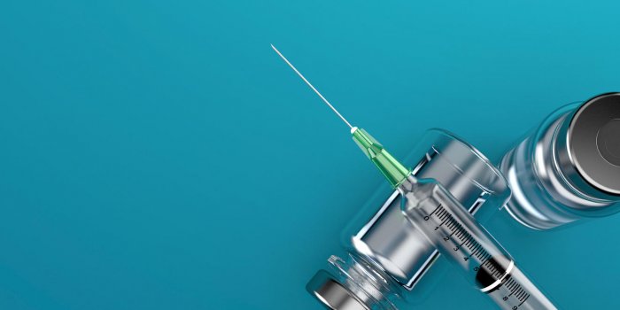 syringe with medical supplies on blue background 3d illustration