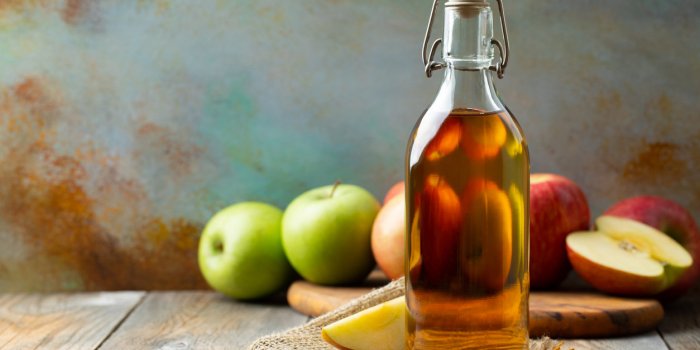 apple vinegar bottle of apple organic vinegar or cider on wooden background healthy organic food with copy space
