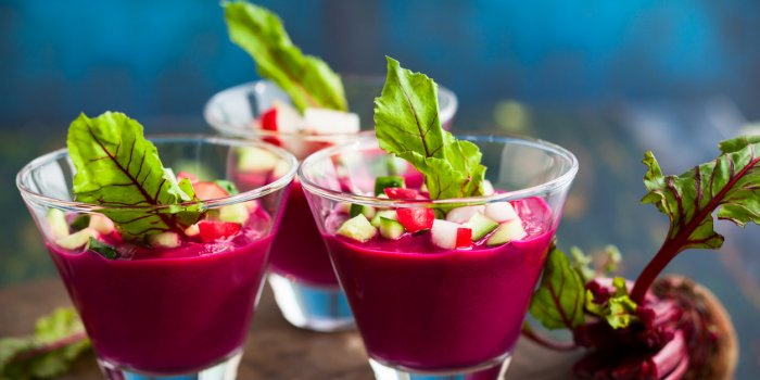 beetroot gazpacho soup with cucumber and radish in glassessoft focus