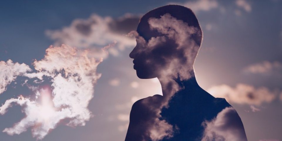 psychology and european woman mental health contemplation concept multiple exposure clouds and sun on female head silhouette