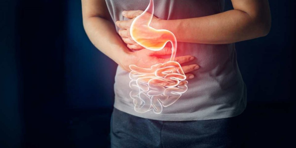 woman touching stomach painful suffering from stomachache causes of menstruation period, gastric ulcer, appendicitis or g...