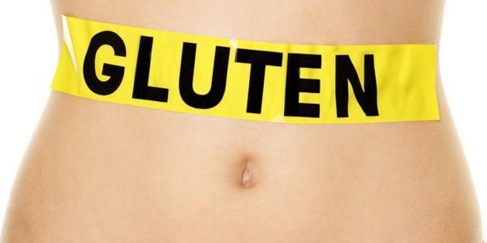 allergie au gluten, la santé et la maladie coeliaque et le concept de digestion avec du texte de gluten écrit sur le ve...
