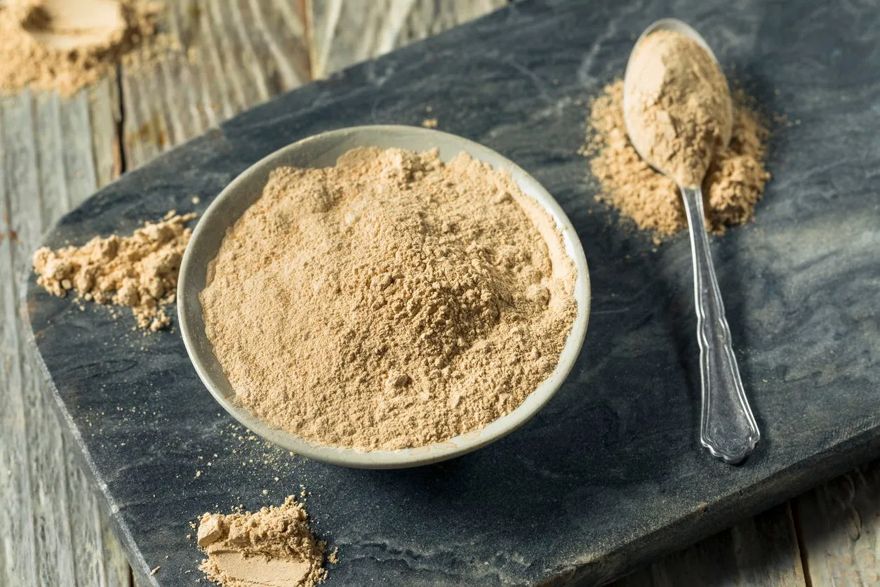 dry organic maca powder superfood in a bowl