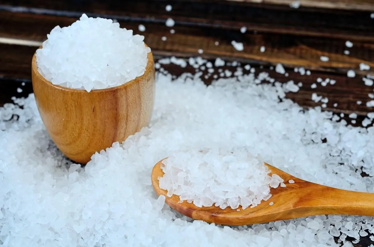 white salt on wooden table