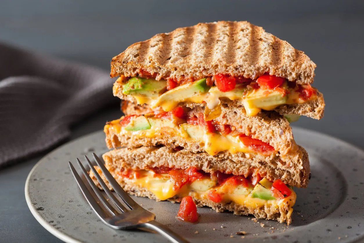 grilled cheese sandwich with avocado and tomato