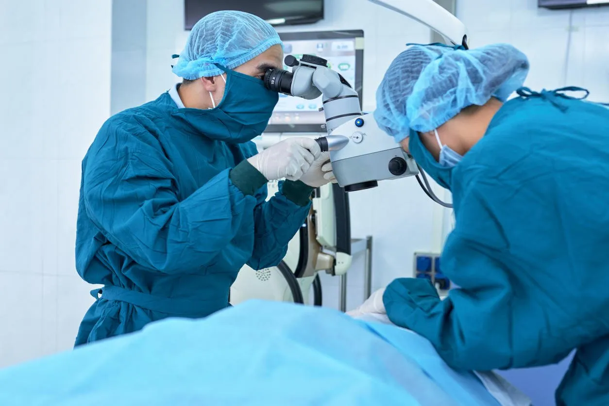surgeons using modern equipment during operation