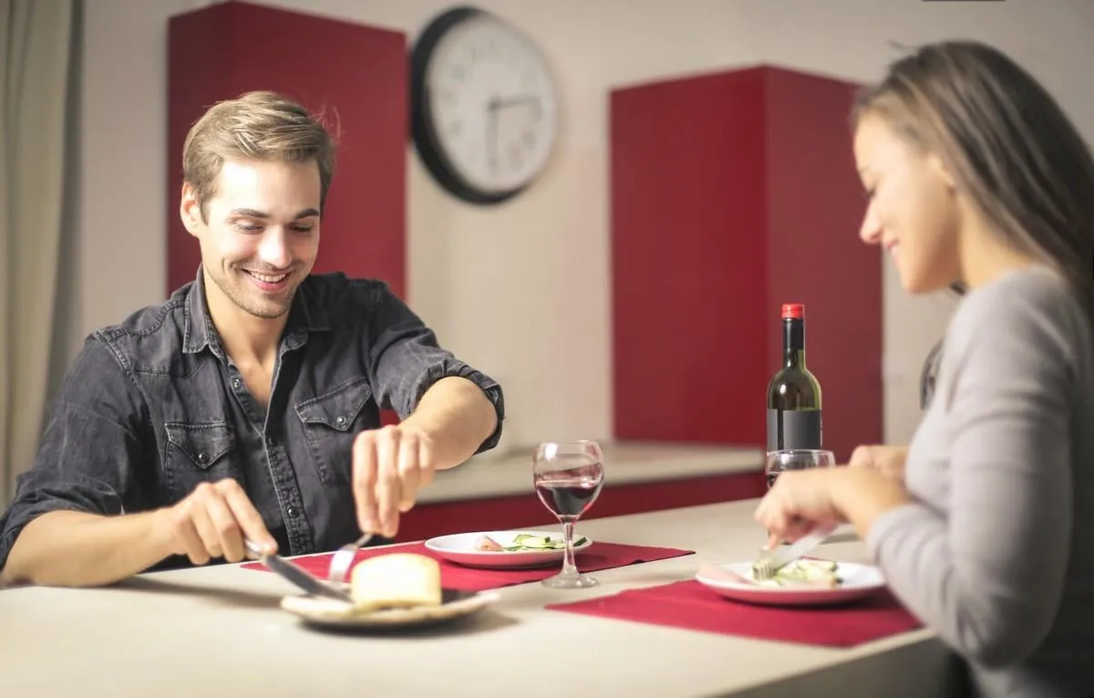 friends having dinner at home together