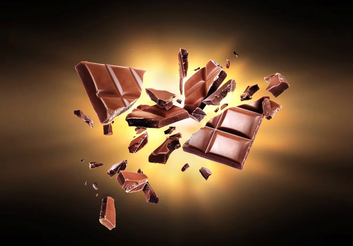 chocolate broken into pieces in the dark
