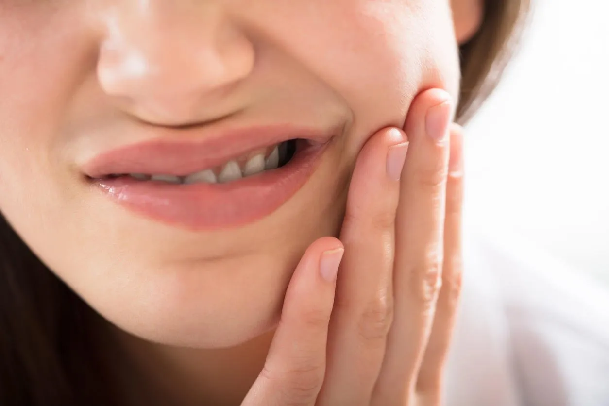 close-up of a woman having tooth problem
