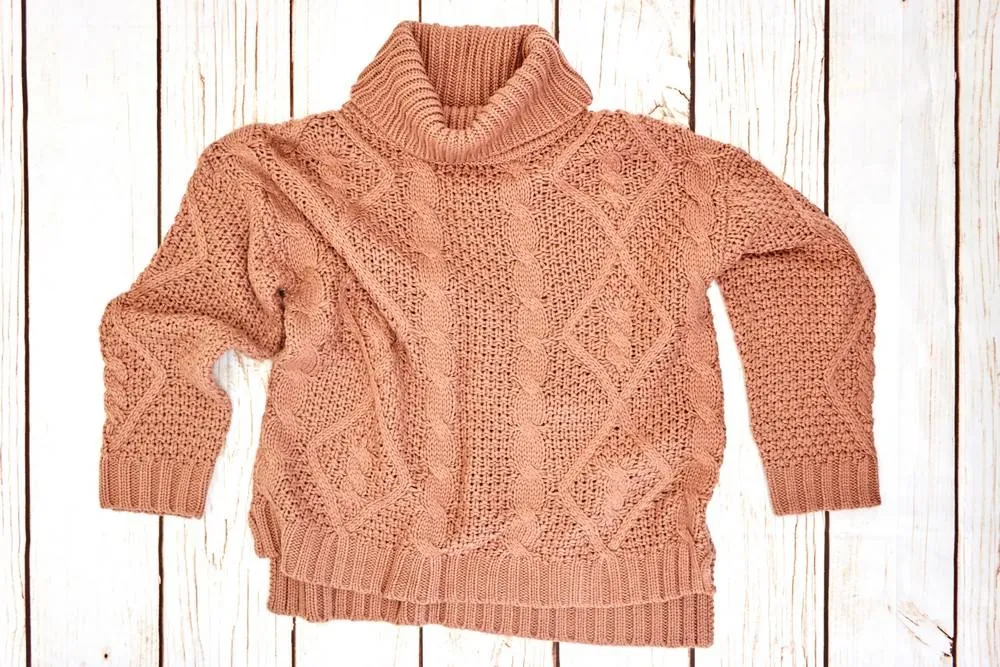 a studio photo of a woolen jumper