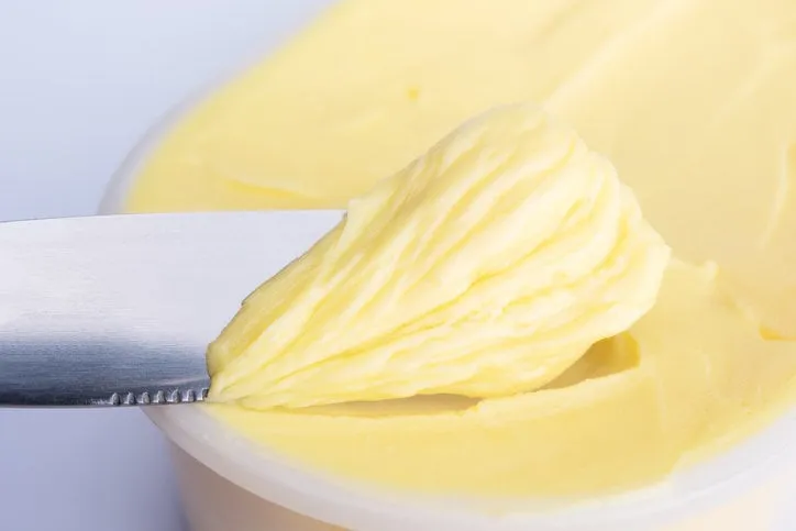 cheese butter or margarine with knife