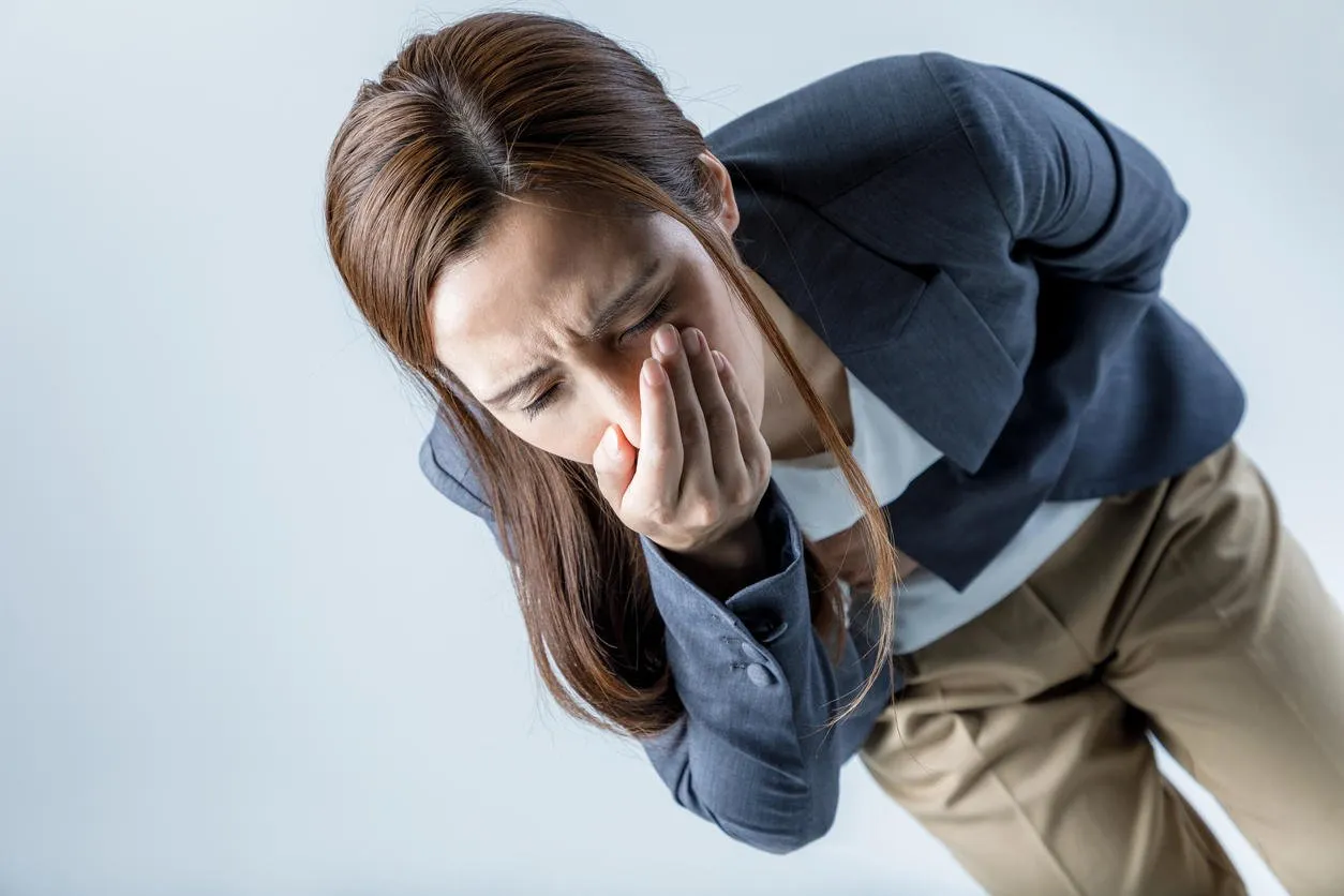 young woman feeling nauseated