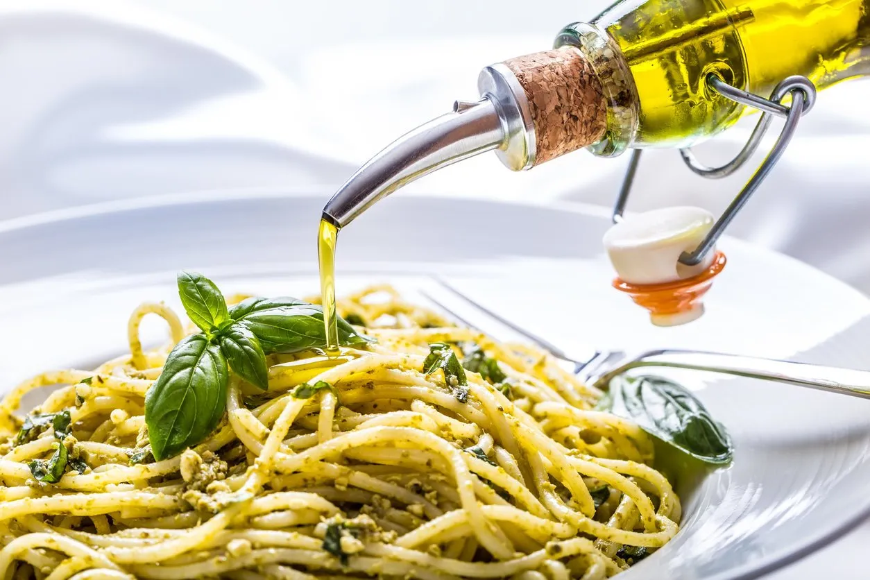 spaghetti spaghetti with homemade pesto sauce olive oil and basil leavesspaghetti spaghetti with homemade pesto sauce olive oil and basil leaves