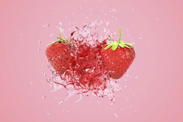 explosion strawberry juicy liquid with strawberry fruit on pink background 3d render
