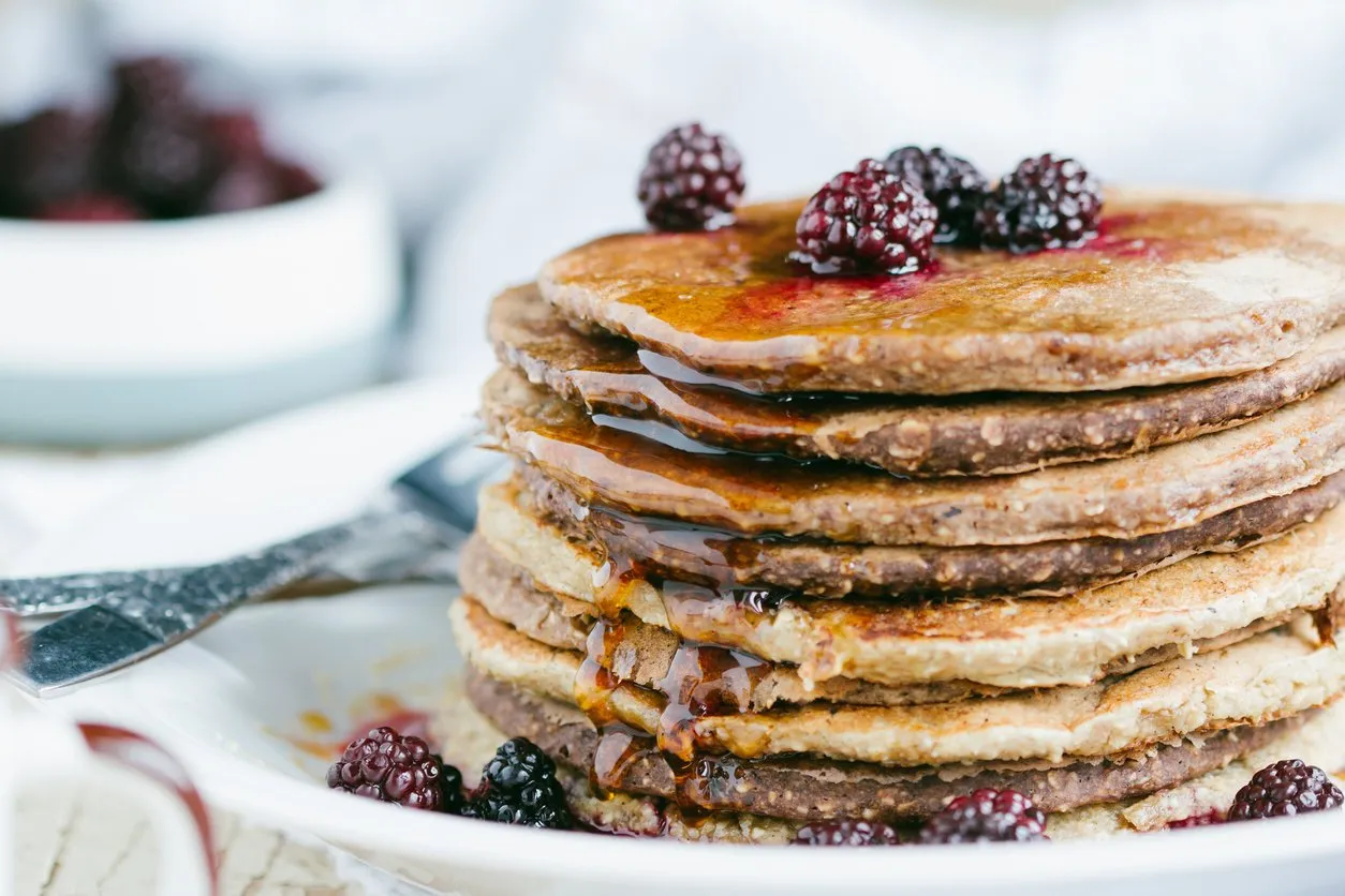 whole wheat oatmeal pancakes with blackberry and syrup