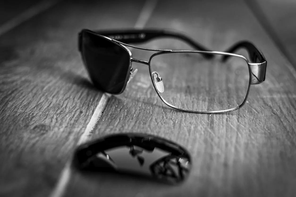 broken sunglasses on the floor as fine art