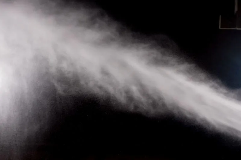 water spray of high pressure water jet on black background