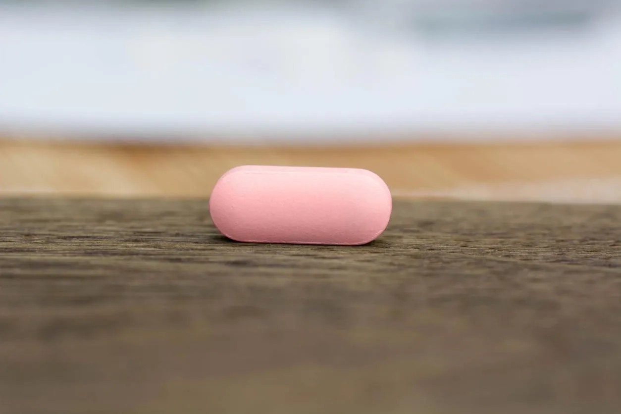 pharmaceutical pink pill close-up, shallow dofviagra for woman concept