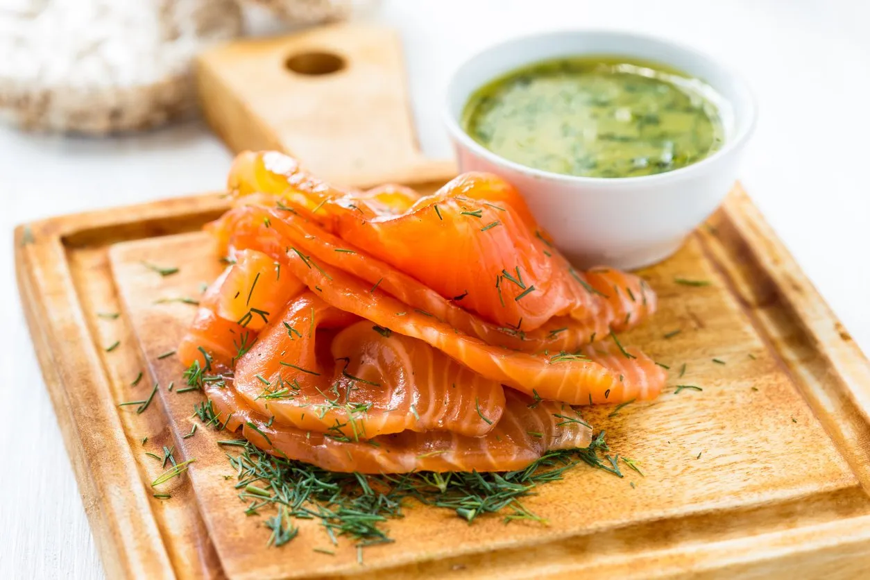 gravadlax, scandinavian-style smoked salmon with dill, and serve with a mustard sauce