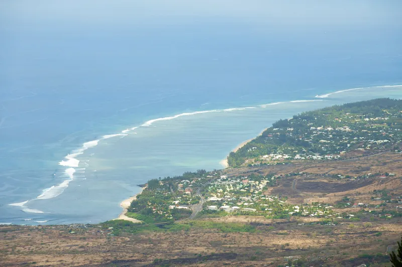 aerial view over the indian ocean coast at les colimatons les hauts at reunion island, french overseas