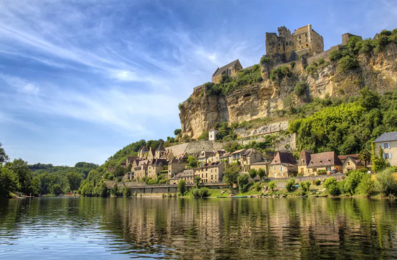 approaching beynac on the river dordogne