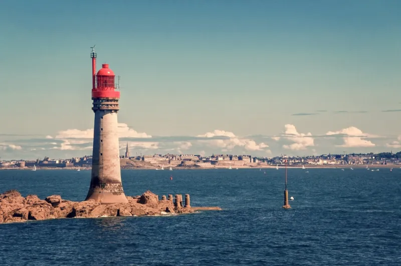 grand jardin lighthouse, town of saint malo in the background, brittany, france