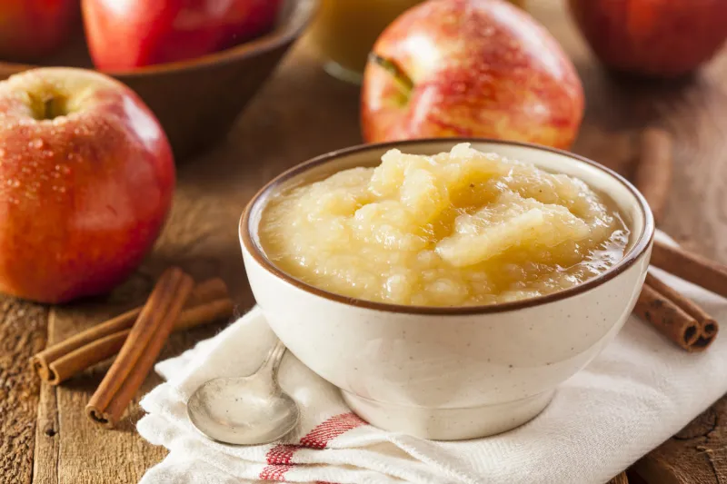 healthy organic applesauce with cinnamon in a bowl