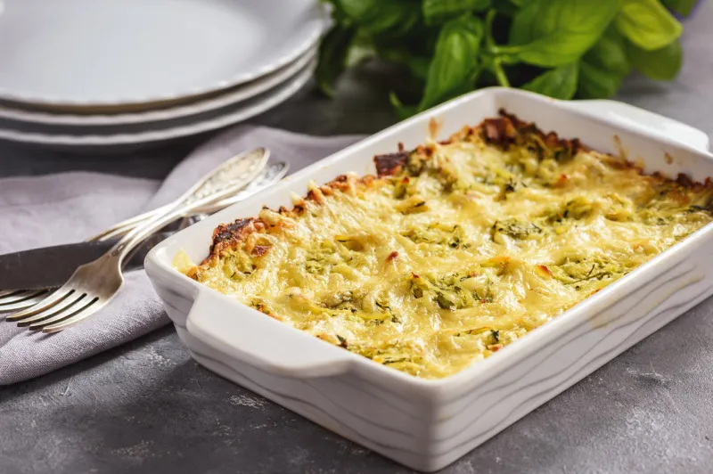 zucchini and potatoe casserole with cheese, vegetarian food