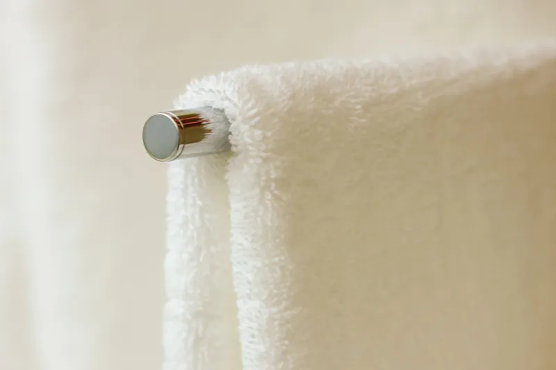 a heated towel rail in a modern apartment block