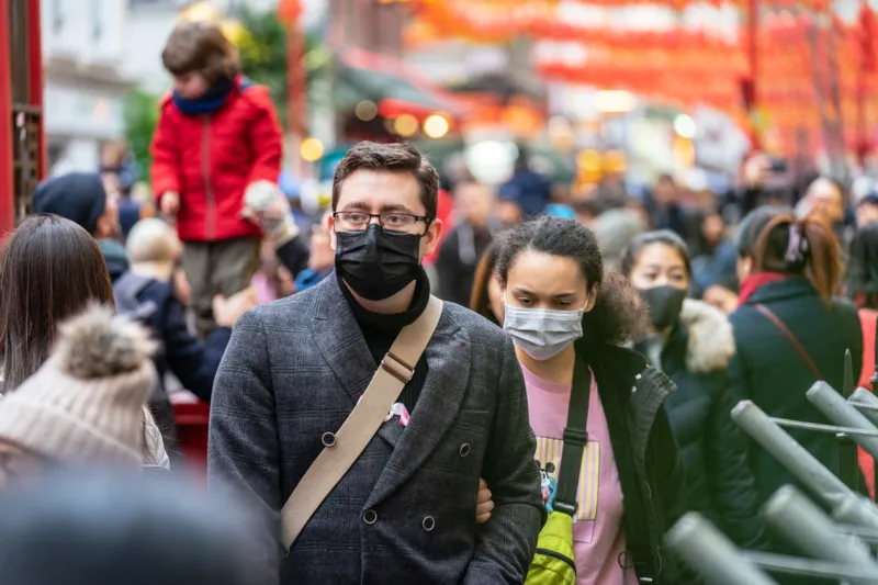 london, january 26, 2020 people wearing a face masks to protecting themself because of epidemic in china selective focus concept of coronavirus quarantine mers-cov, middle east respiratory syndrome coronavirus, novel coronavirus 2019-ncov