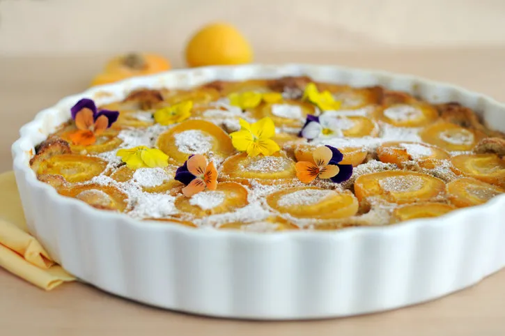 apricot clafoutis with edible flowers