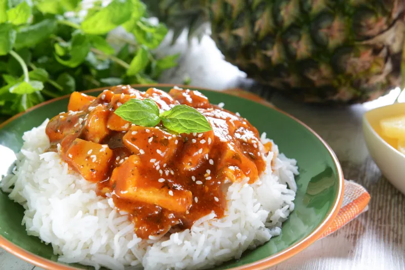 chicken in caribbean style with pineapple and rice