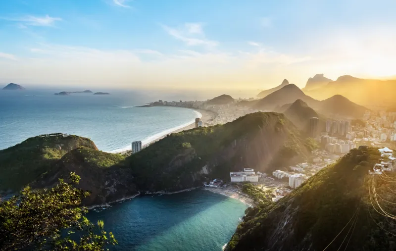 aerial view of rio de janeiro coast with copacabana and praia vermelha beach at sunset - rio de janeiro, brazil