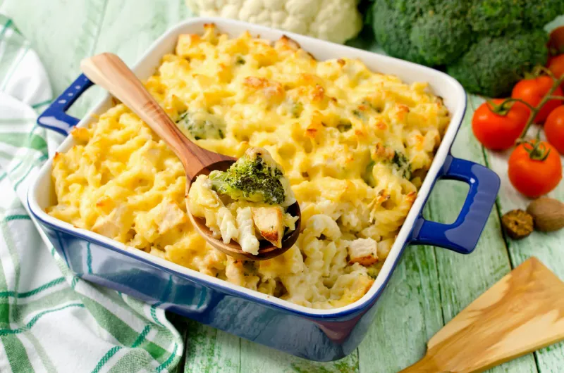 casserole with pasta, chicken, broccoli and bechamel sauce under a cheese crust