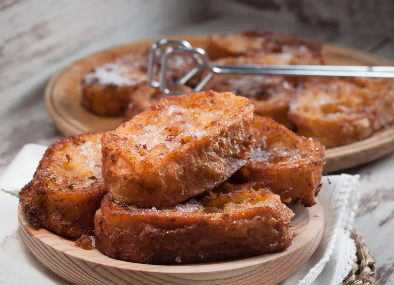 french toasts on a wooden plate a delicious mealfrench toasts on a wooden plate delicious meal