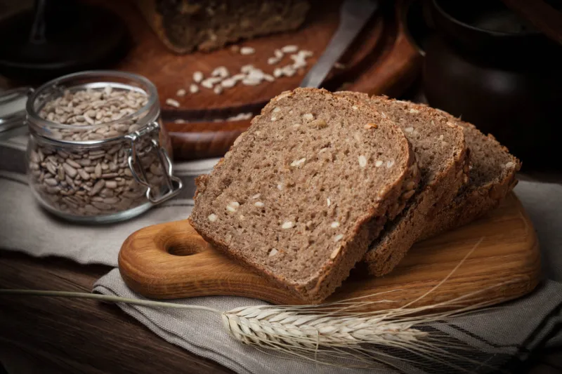 wholemeal bread with sunflower seeds dark light